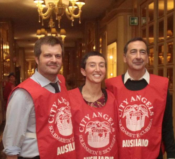 Da sx: Pierfrancesco Majorino, Francesca Balzani e Giuseppe Sala al pranzo della Befana organizzato per i clochard milanesi all'Hotel Principe di Sav