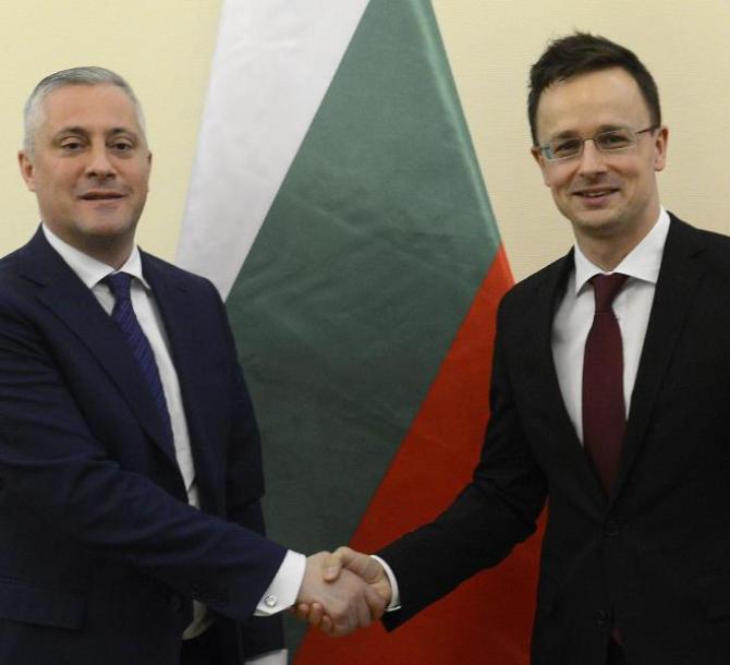 epa05216442 Hungarian Minister of Foreign Affairs and Trade Peter Szijjarto (R) receives Bulgarian Economy Minister Bozhidar Lukarski (L) in the Mini