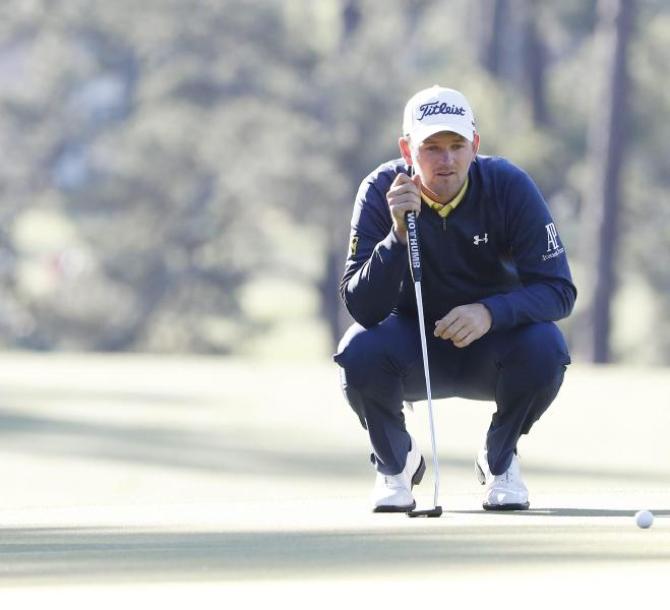 epa05247821 Bernd Wiesberger of Austria lines up his putt on the first hole duiring the first round of the 2016 Masters Tournament at the Augusta Nat